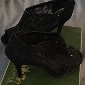 Zip up, heeled, peep toe black booties. HOT!